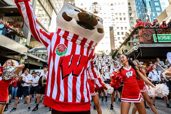 Members of the UW Spirit Squad, the UW Band and UW mascot Bucky Badger